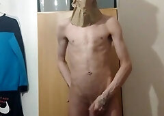 Highly softcore thin teenie puts a paper bag over his head and ripples his assets