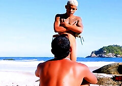 Providing it to the well-gifted boy on the beach!
