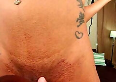 This Grooby VR scene features an black trans woman with a big stomach and navel piercing riding and getting fucked in missionary and reverse cowgirl o