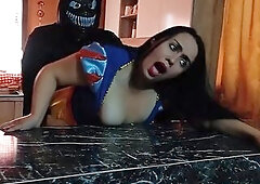In suit, I drilled my stepmother who was clothed as Snow White for Halloween in the kitchen.