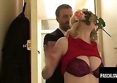Busty submissive plays dual roles with flower and cock