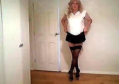 Black stockings, miniskirt and no knickers