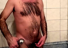 Hairy hunk Earl enjoys a sensual bath and shower at the motel
