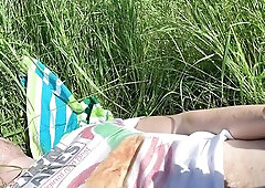 We wanted to have a fun the sunny summer day and made a tiny picnic near the river bank. People walked and drove by. Nobody caught us, but it was stil