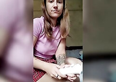 Mistresse Anastasia fondles her vagina with a sex tool achieving an intensive climax