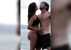 Public beach. This babe jerks him off in the water, takes the load str8 in her throat, then keeps going sloppy BJ, standing doggy, and this guy cums a