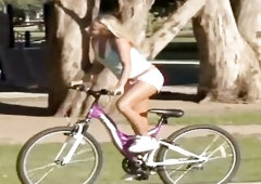 A drive out and a swim later, the tattooed redhead has the golden-haired without her pink shorts on the green bed. That babe licks her nipps, runs her